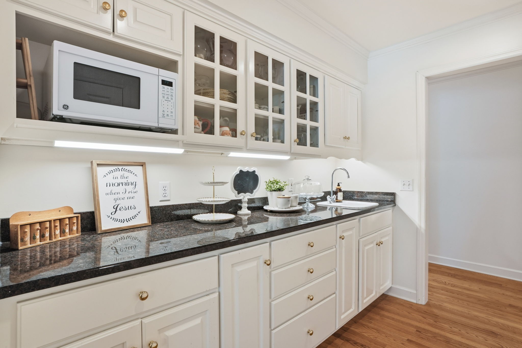 218 Spring Valley Road Hendersonville, TN 37075 - Photo 11 of 60 a kitchen with stainless steel appliances granite countertop a sink and a microwave