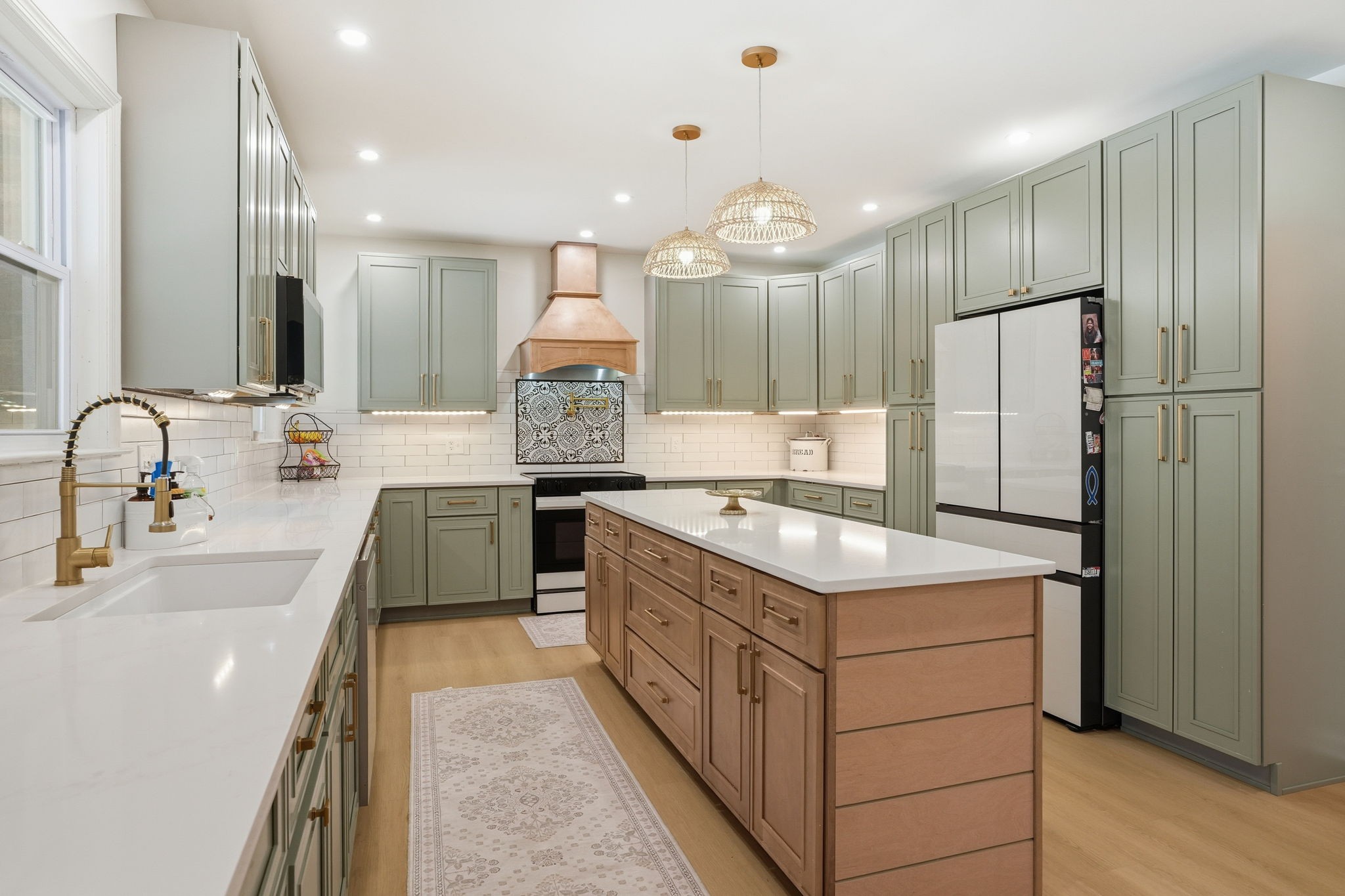 218 Spring Valley Road Hendersonville, TN 37075 - Photo 17 of 60 a kitchen with stainless steel appliances granite countertop a sink stove and refrigerator