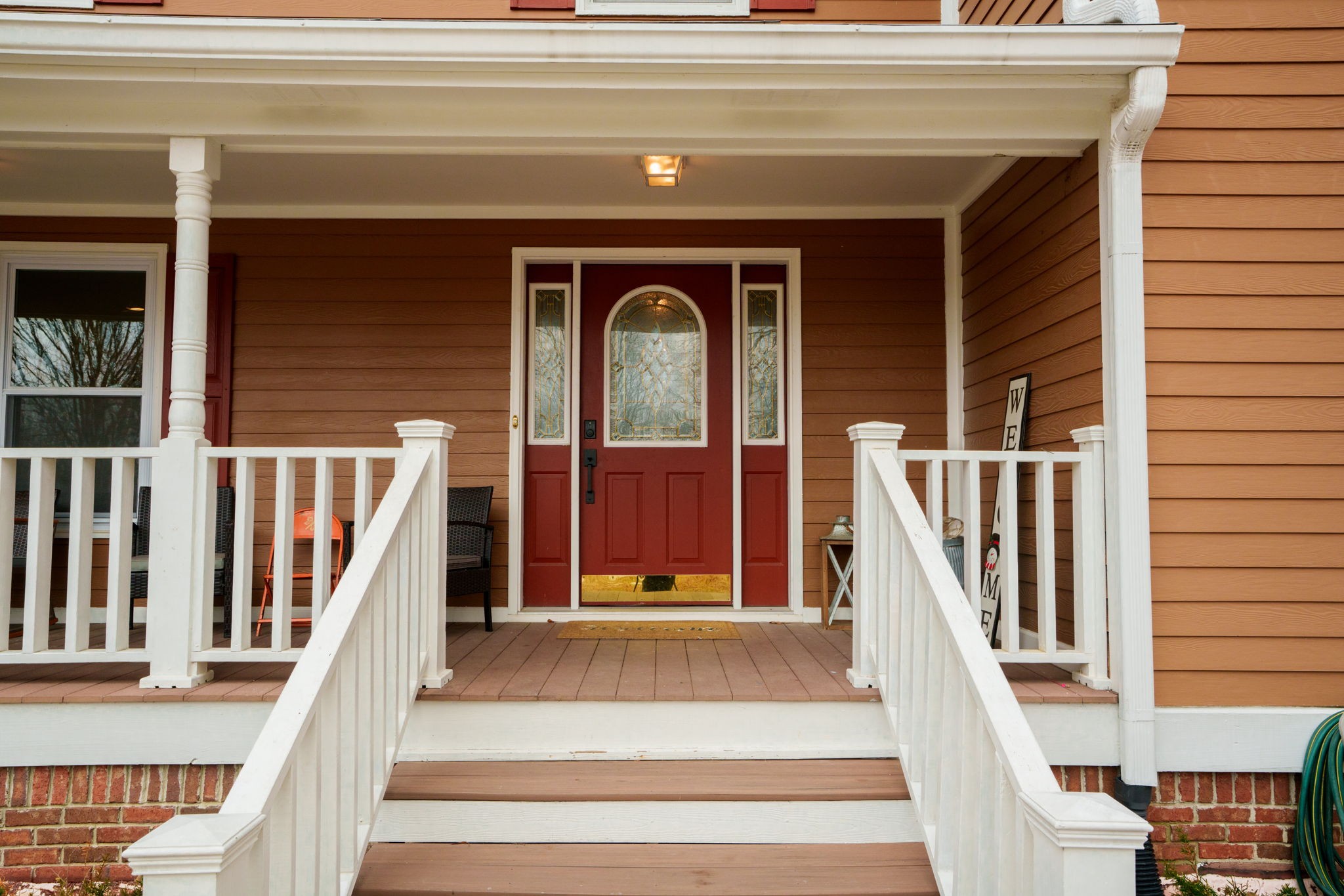 218 Spring Valley Road Hendersonville, TN 37075 - Photo 3 of 60 a front view of a house with wooden floor and a large window
