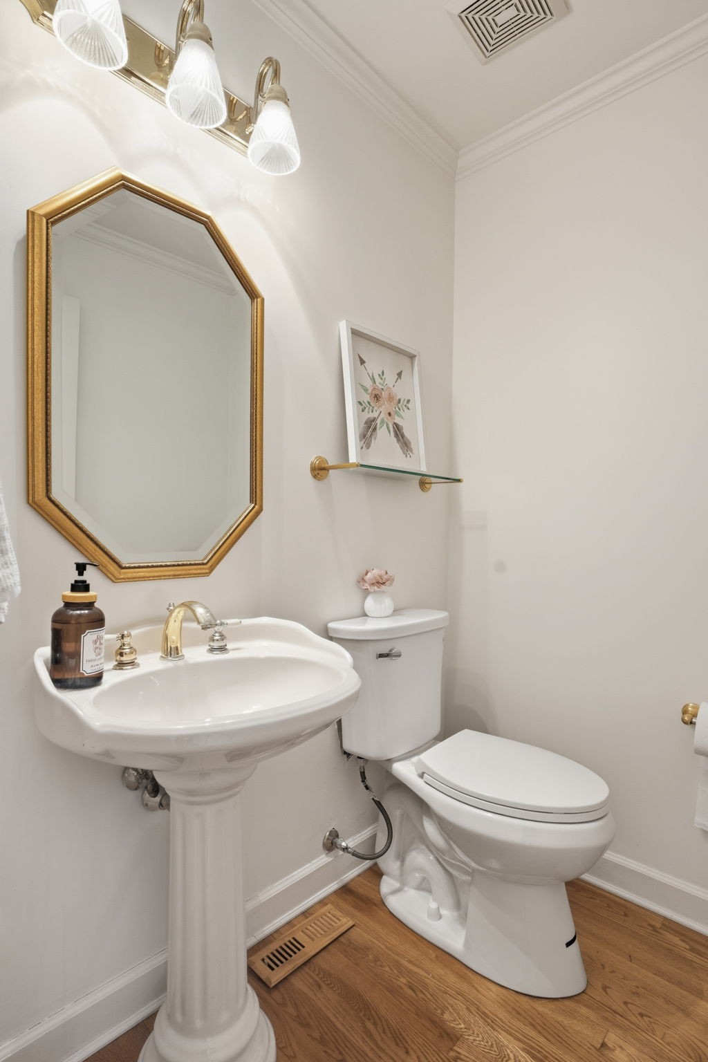 218 Spring Valley Road Hendersonville, TN 37075 - Photo 31 of 60 a bathroom with a toilet sink and mirror
