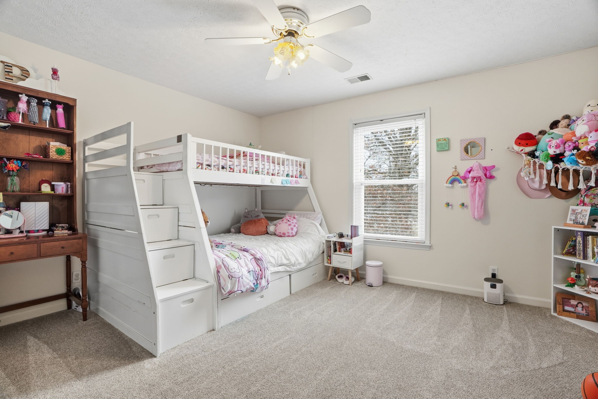 218 Spring Valley Road Hendersonville, TN 37075 - Photo 34 of 60 a bedroom with a bed and a chandelier