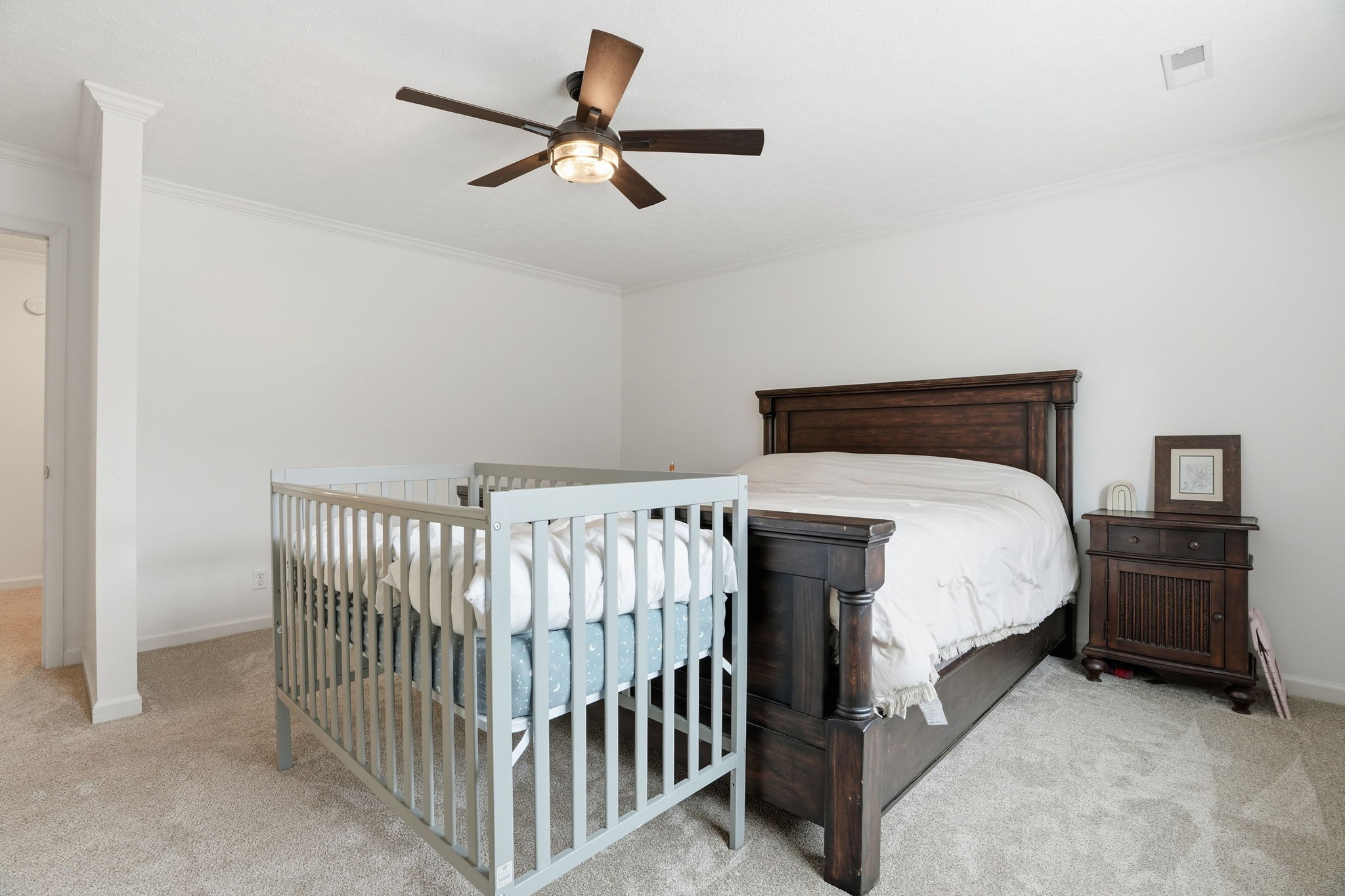 218 Spring Valley Road Hendersonville, TN 37075 - Photo 40 of 60 a bed sitting in a bedroom next to a window