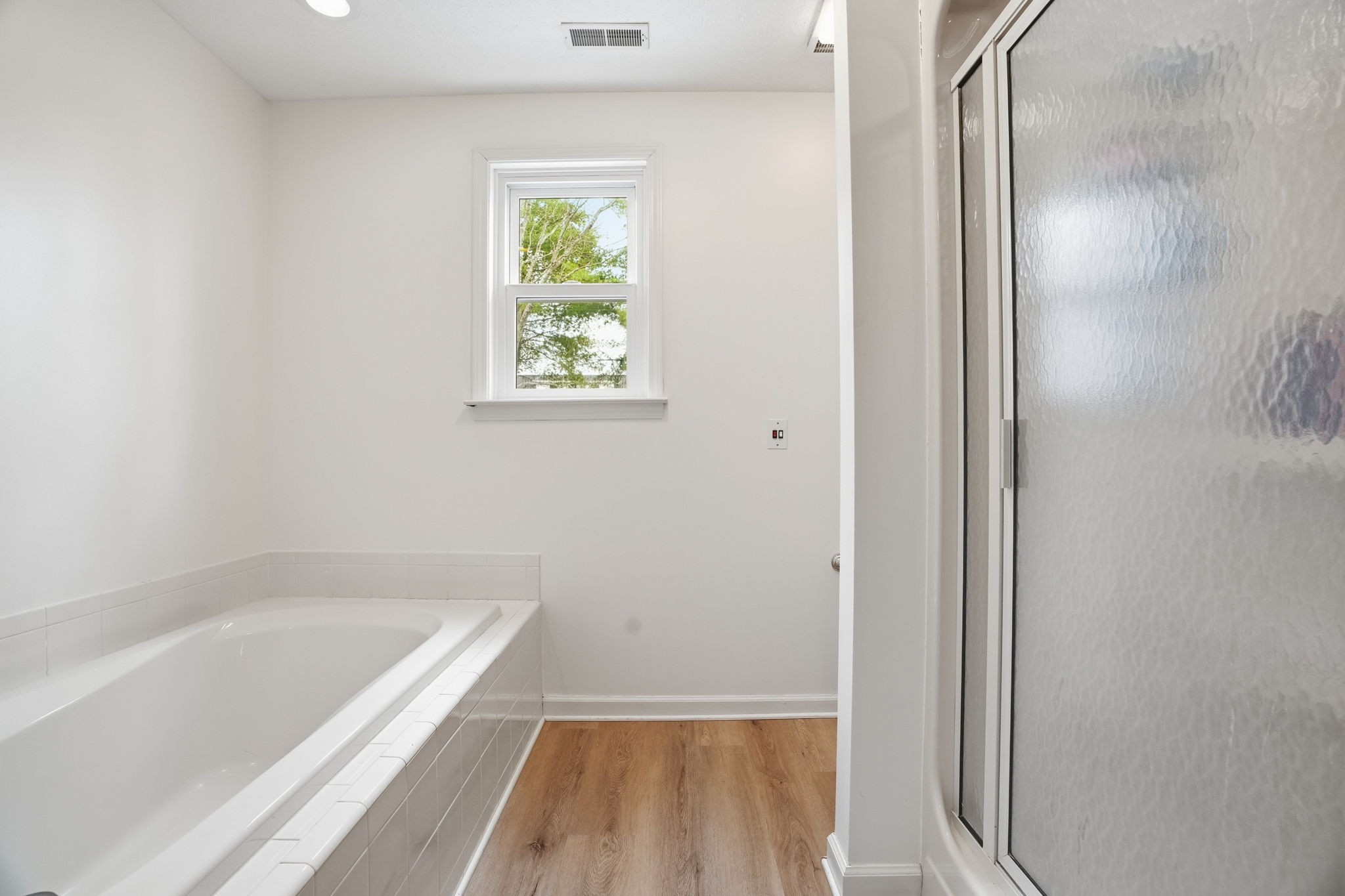 218 Spring Valley Road Hendersonville, TN 37075 - Photo 42 of 60 a bathroom with a tub and shower