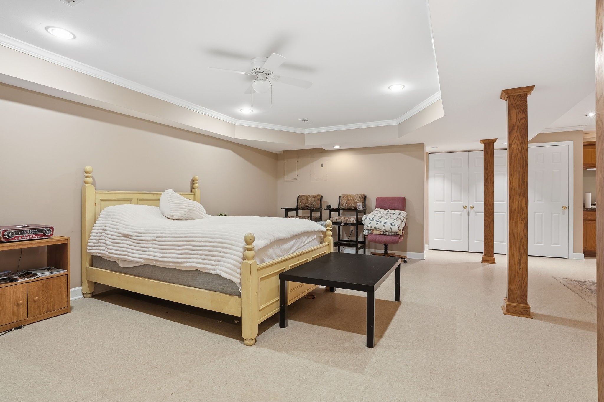 218 Spring Valley Road Hendersonville, TN 37075 - Photo 45 of 60 a bedroom with a bed and a chandelier