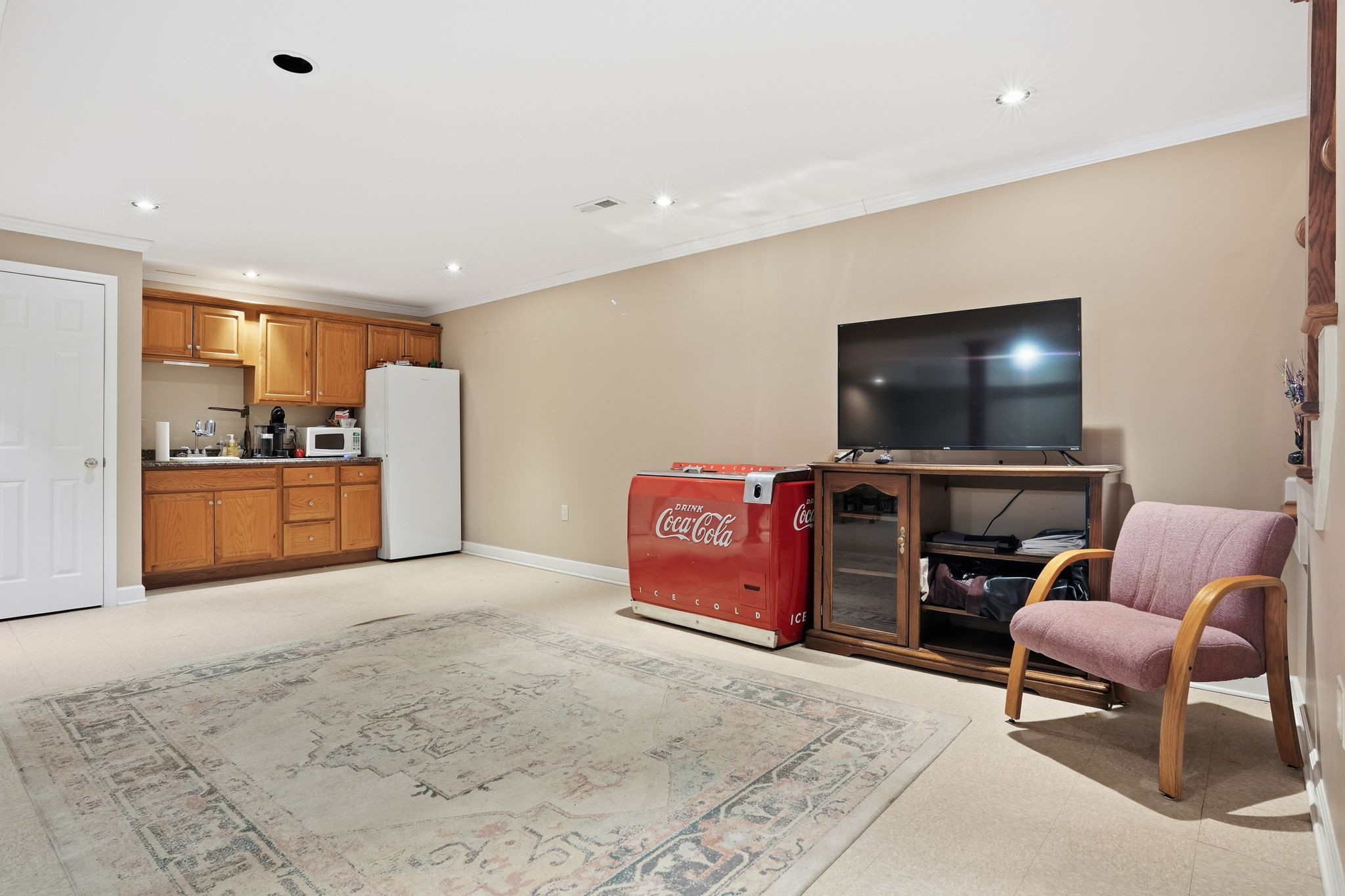 218 Spring Valley Road Hendersonville, TN 37075 - Photo 46 of 60 a room with furniture and a flat screen tv