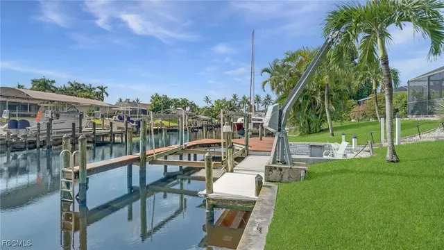 a view of a lake with couches and city view