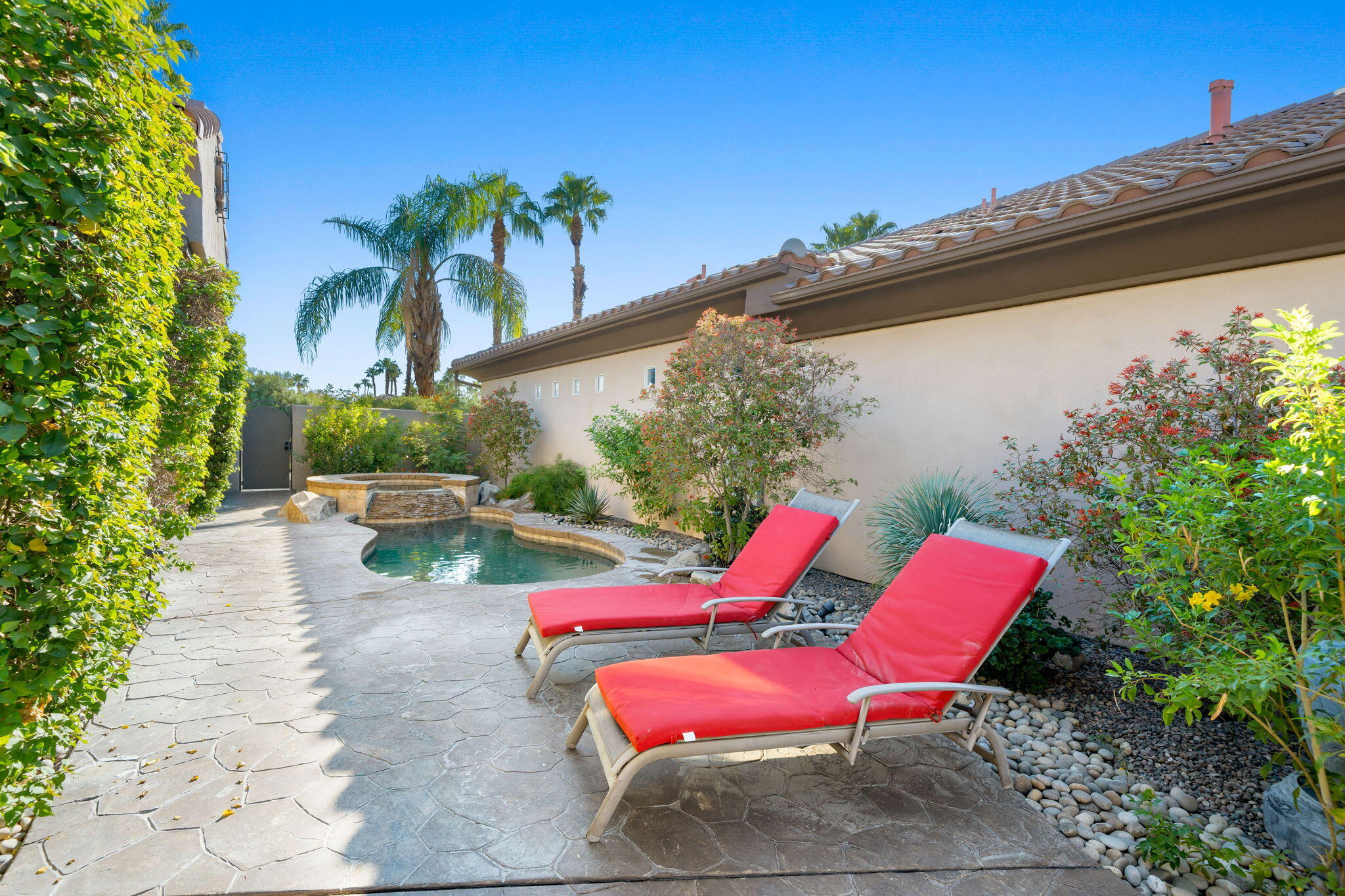 27 Racquet Club Drive South Rancho Mirage, CA 92270 - Photo 9 of 44 a view of a backyard with sitting area