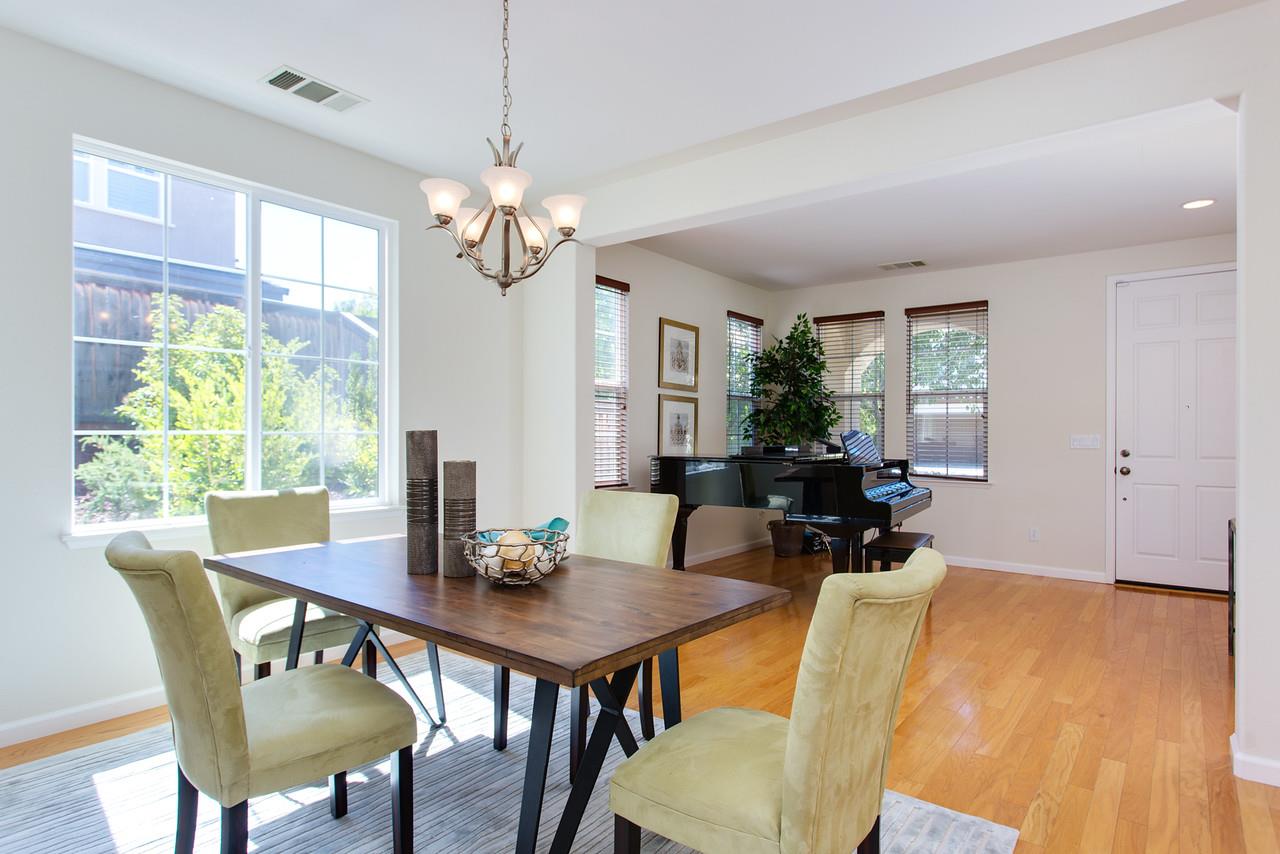 1615 Farringdon Way San Ramon, CA 94582 - Photo 3 of 18 a view of a dining room with furniture window and wooden floor