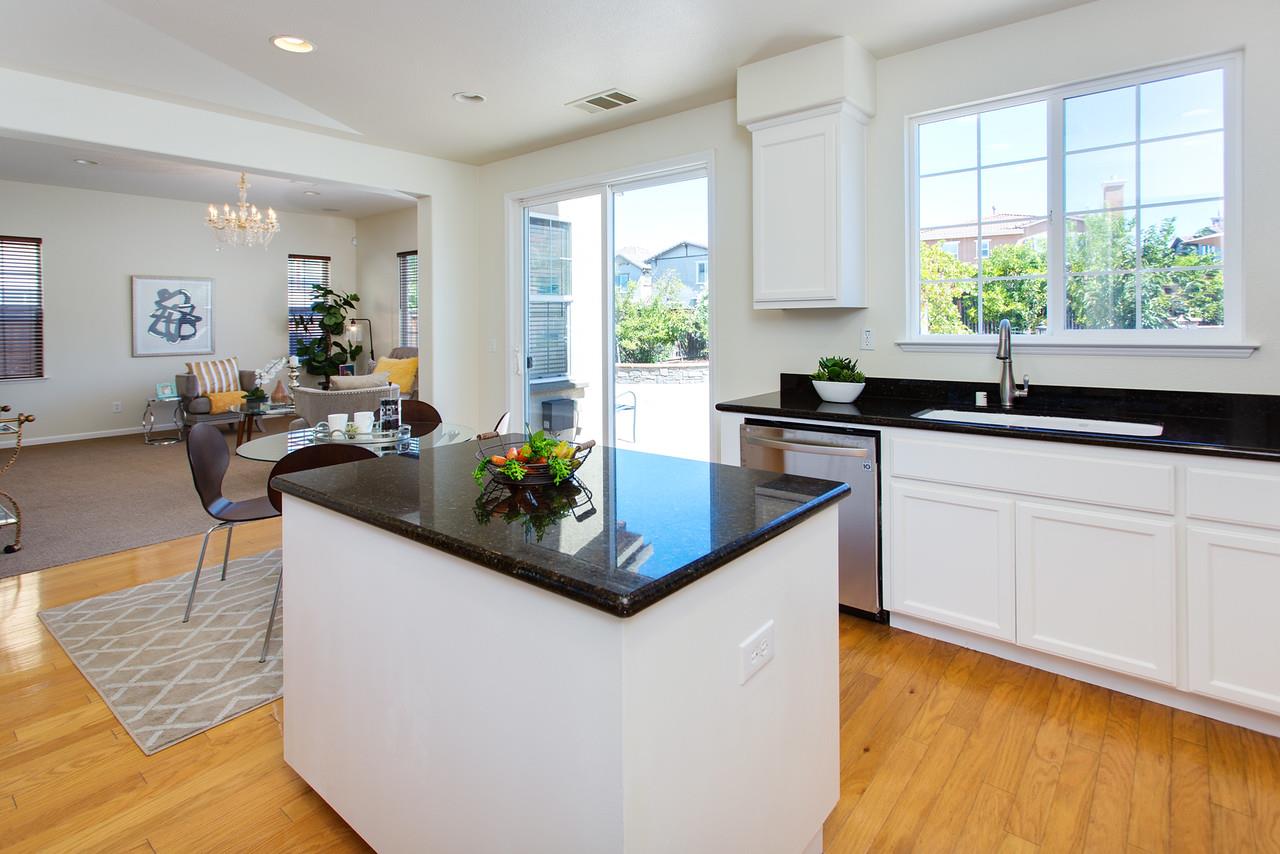 1615 Farringdon Way San Ramon, CA 94582 - Photo 6 of 18 a kitchen with stainless steel appliances granite countertop sink stove top oven and cabinets