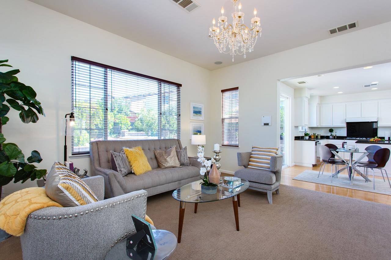 1615 Farringdon Way San Ramon, CA 94582 - Photo 7 of 18 a living room with furniture and a large window