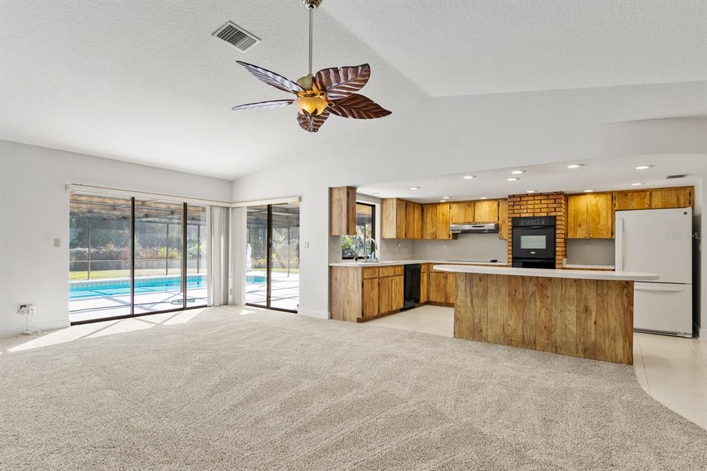 10206 Lakeview Drive New Port Richey, FL 34654 - Photo 17 of 53 a view of an empty room with window and cabinet