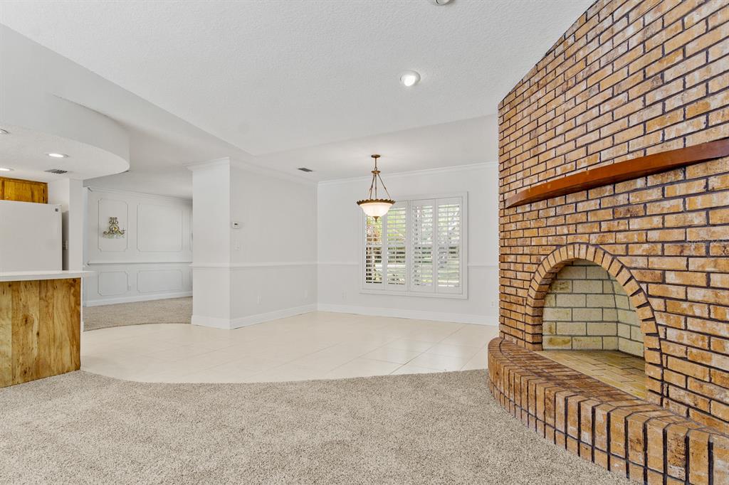 10206 Lakeview Drive New Port Richey, FL 34654 - Photo 19 of 53 a view of livingroom with kitchen and furniture