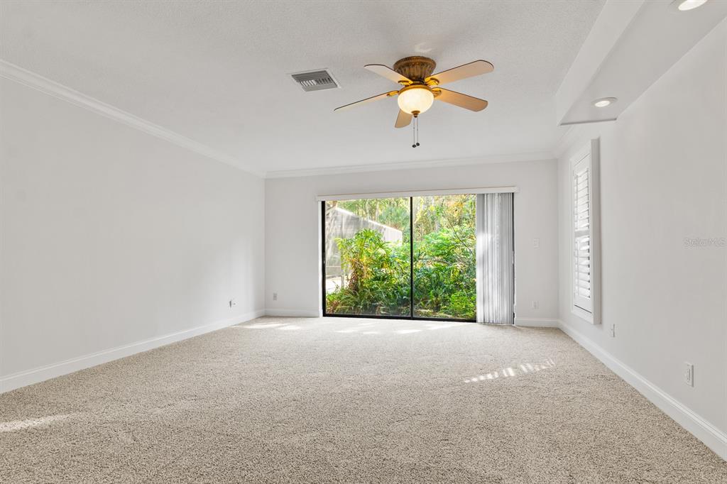 10206 Lakeview Drive New Port Richey, FL 34654 - Photo 22 of 53 an empty room with windows