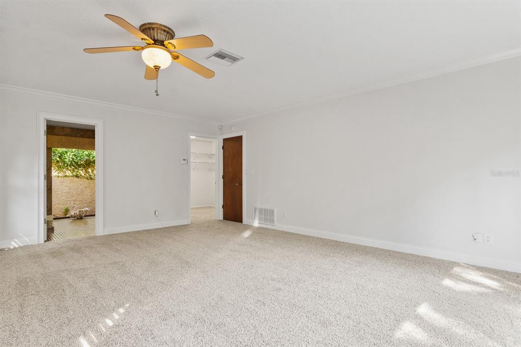 10206 Lakeview Drive New Port Richey, FL 34654 - Photo 23 of 53 an empty room with a window