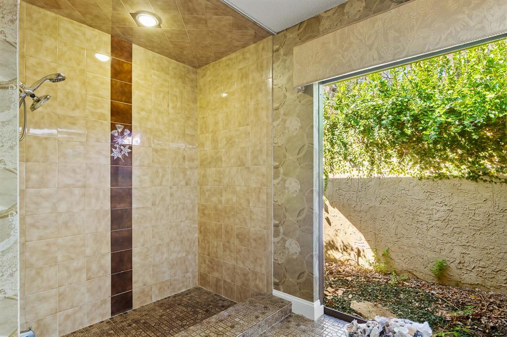 10206 Lakeview Drive New Port Richey, FL 34654 - Photo 25 of 53 a bathroom with a shower