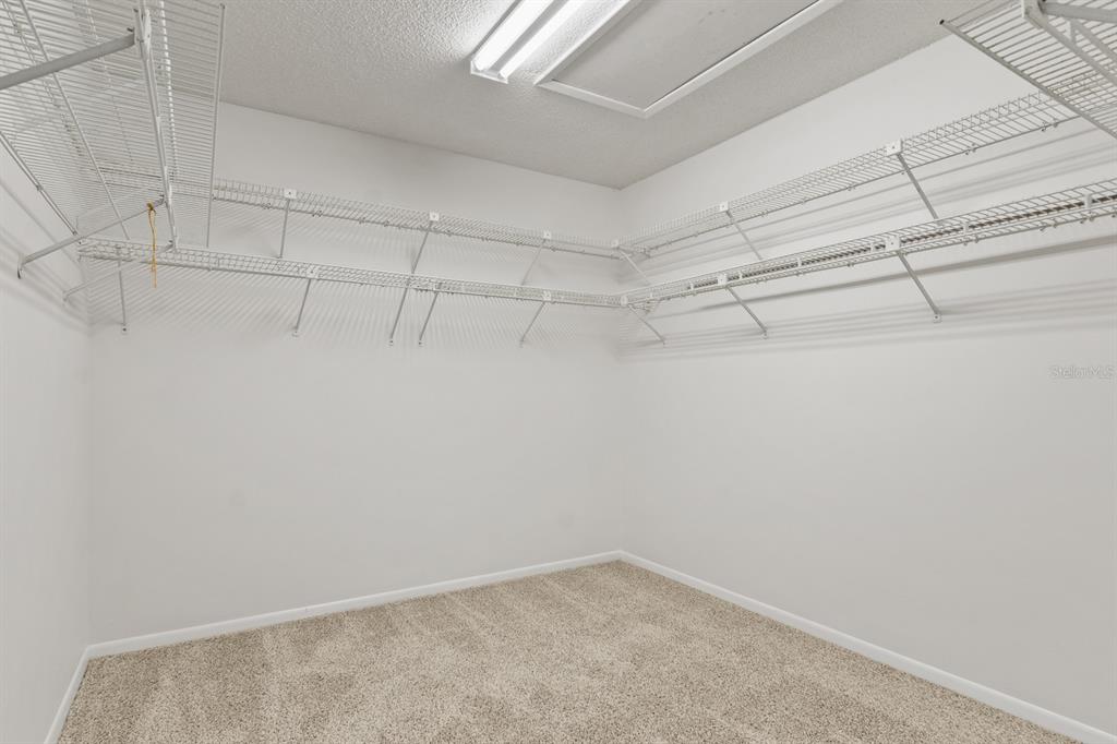 10206 Lakeview Drive New Port Richey, FL 34654 - Photo 27 of 53 a view of a room with racks on the wall