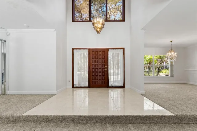 an entryway with a bench in it