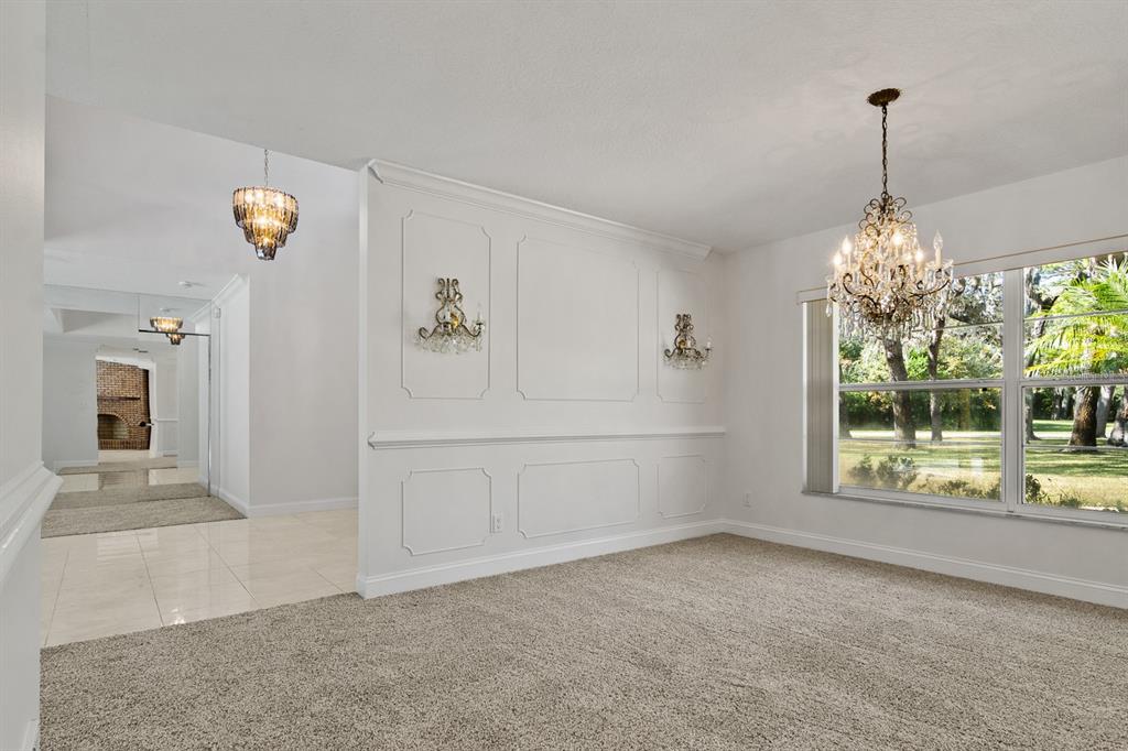 10206 Lakeview Drive New Port Richey, FL 34654 - Photo 8 of 53 a view of a room with window and cabinet