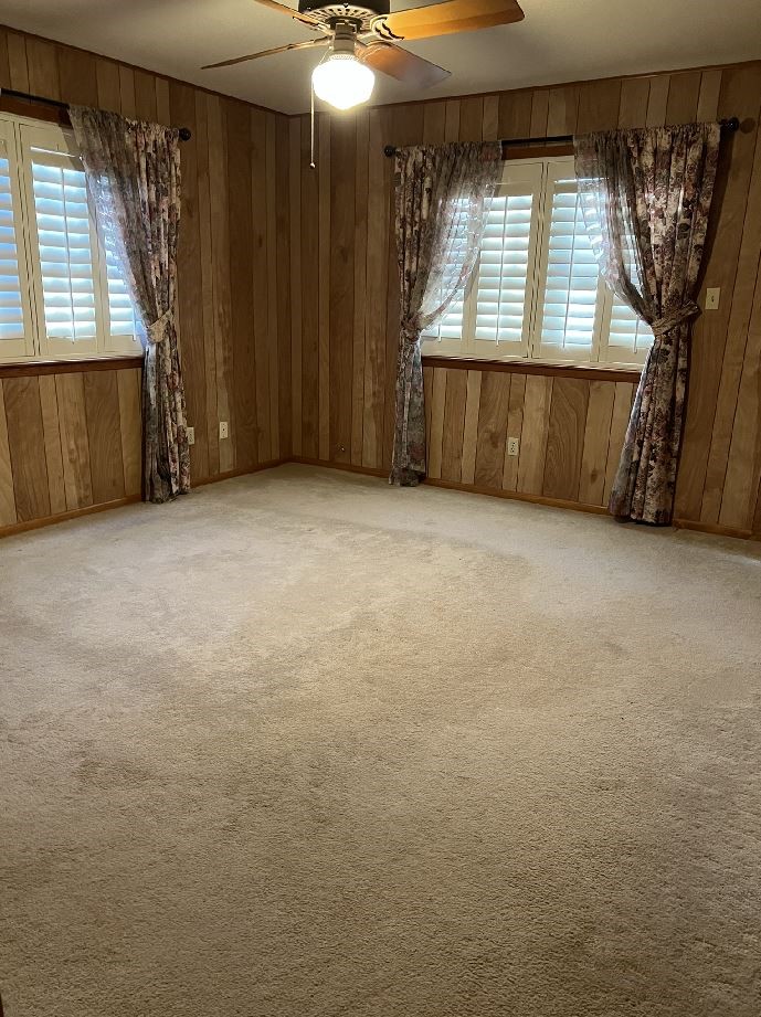 507 North Rusk Street Wharton, TX 77488 - Photo 11 of 18 an empty room with windows and fan