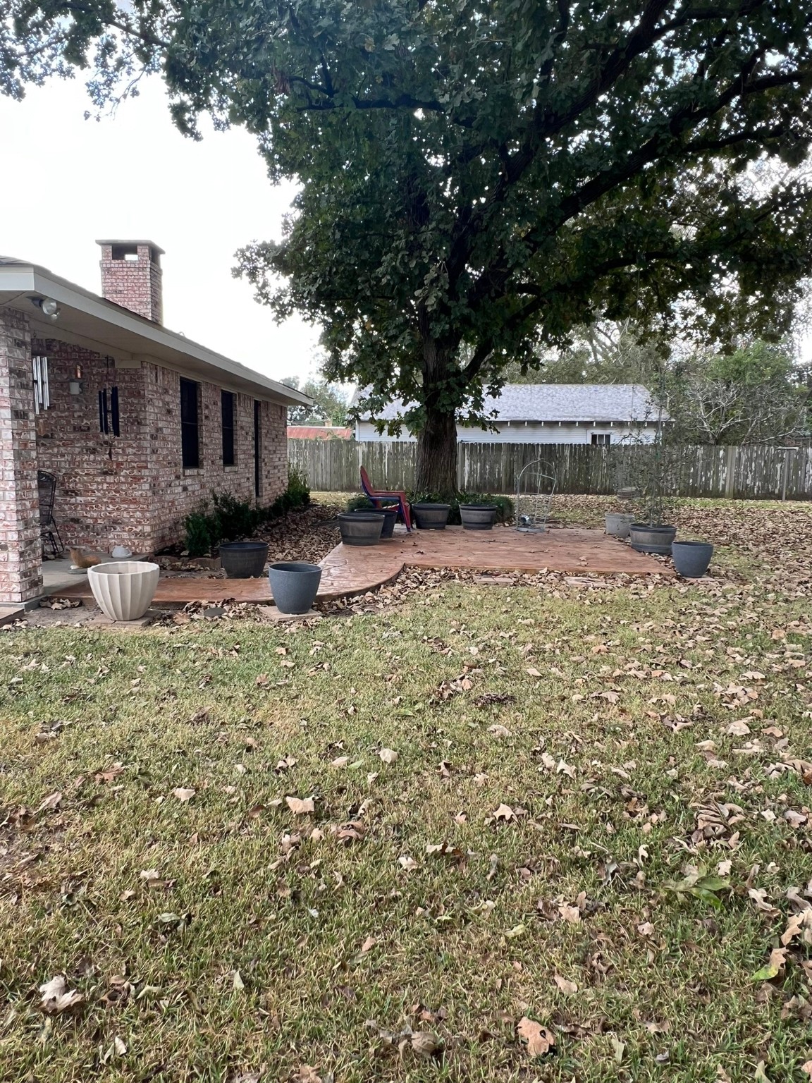 507 North Rusk Street Wharton, TX 77488 - Photo 17 of 18 a backyard of a house with yard barbeque oven and outdoor seating