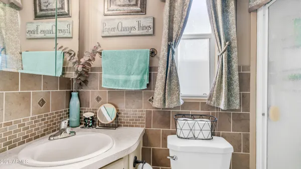 a workspace with furniture and a flat screen tv