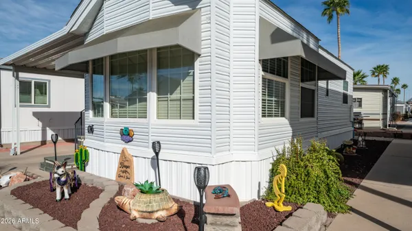 a view of a terrace with furniture and stove
