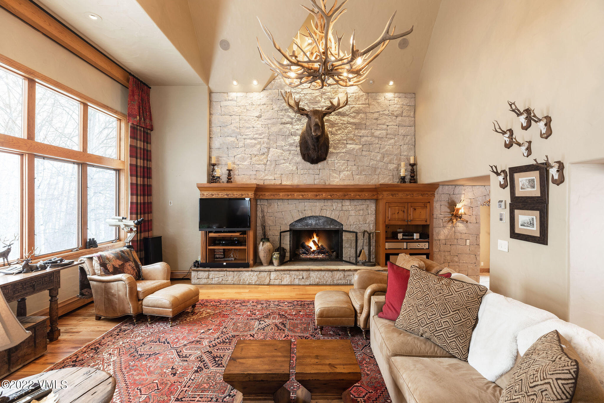 106 Pilgrim Drive Edwards, CO 81632 - Photo 1 of 21 a living room with furniture large window and fireplace