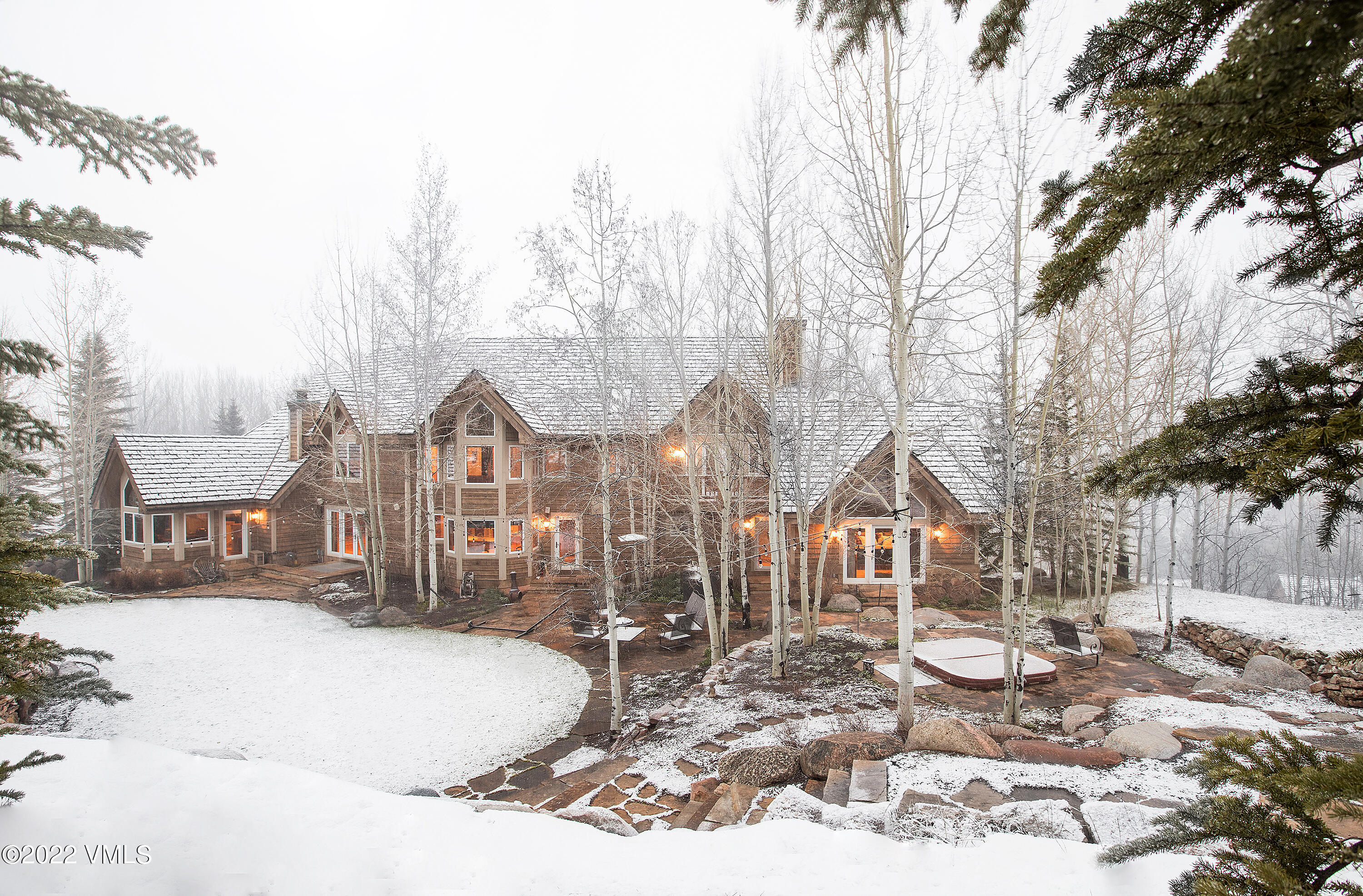 106 Pilgrim Drive Edwards, CO 81632 - Photo 18 of 21 a view of a house with a yard covered in snow