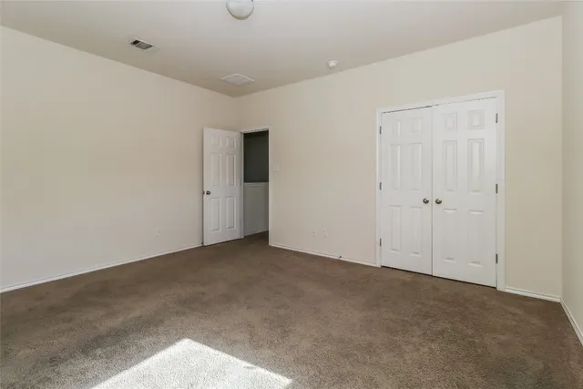 an empty room with an entryway