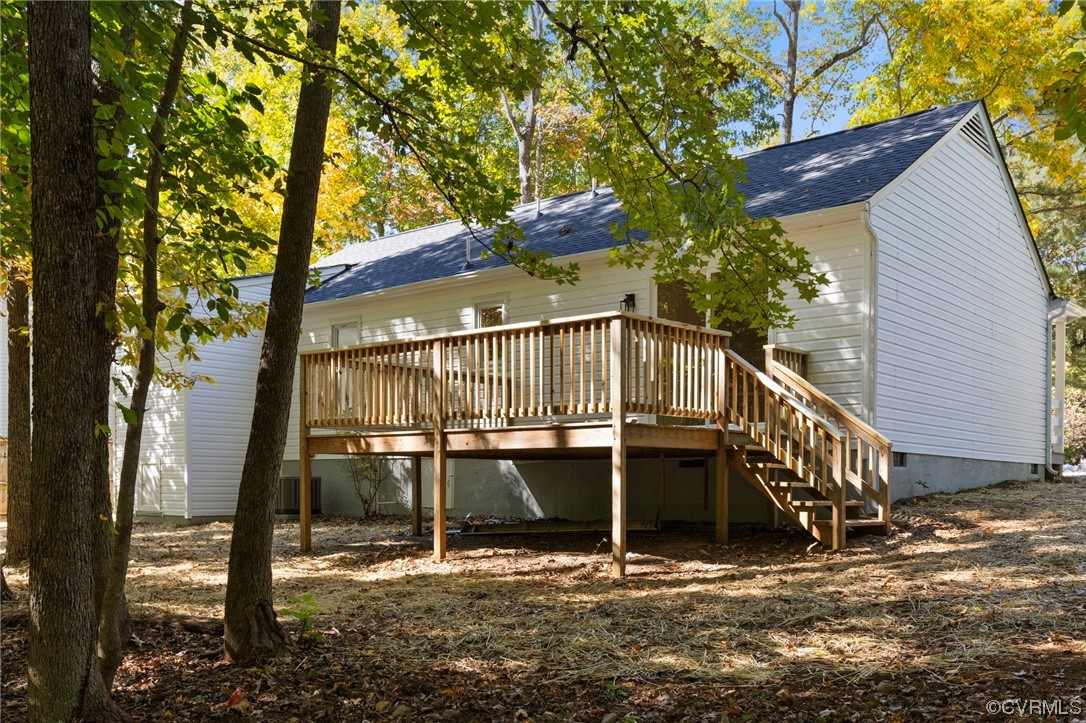 1413 Oldbury Road Midlothian, VA 23113 - Photo 22 of 24 a view of a house with a tree next to a yard