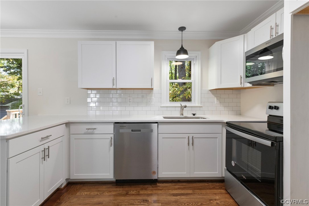1413 Oldbury Road Midlothian, VA 23113 - Photo 8 of 24 a kitchen with white cabinets appliances and a window