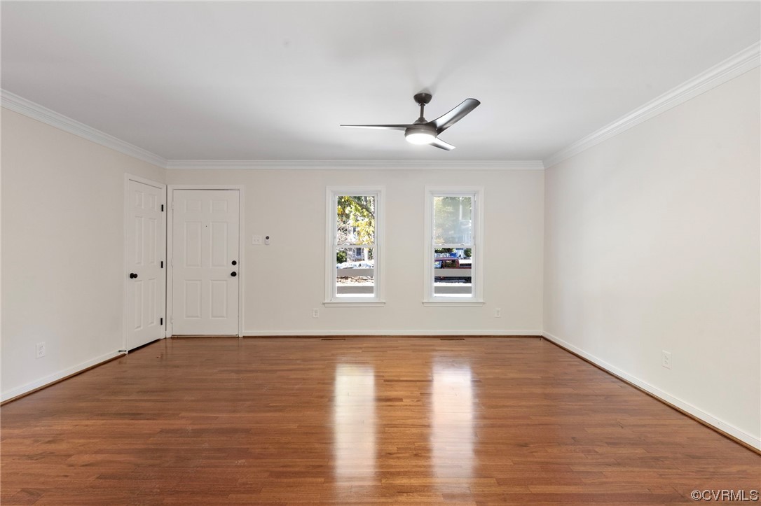 1413 Oldbury Road Midlothian, VA 23113 - Photo 9 of 24 a view of an empty room with wooden floor and a window