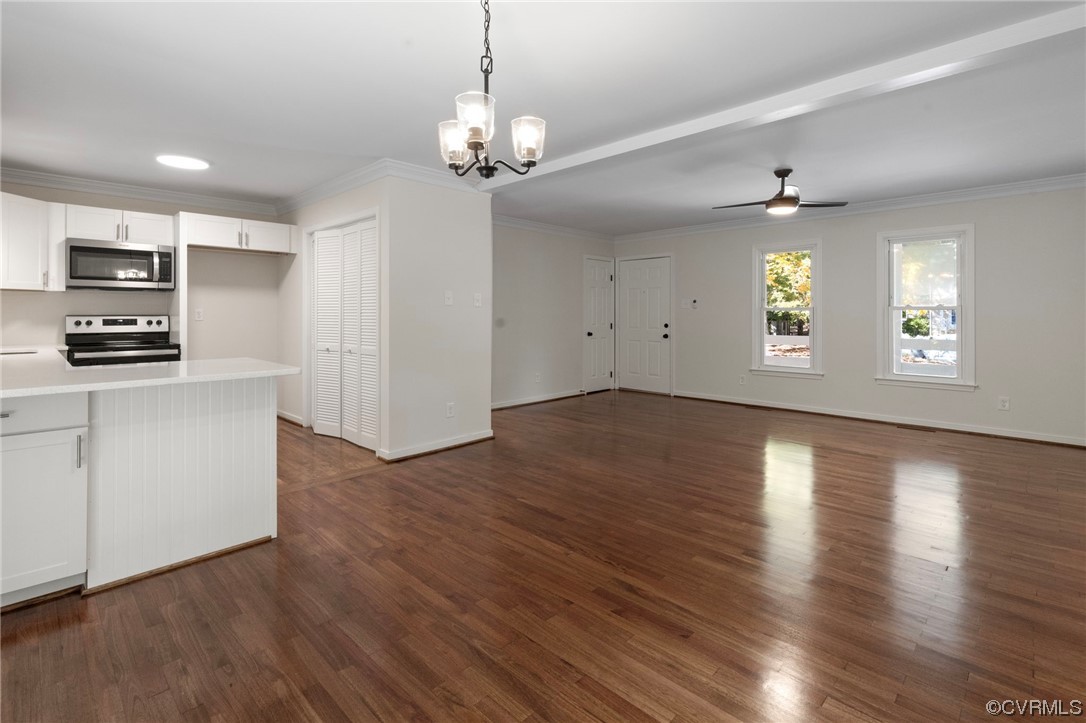 1413 Oldbury Road Midlothian, VA 23113 - Photo 10 of 24 a view of a kitchen with a sink wooden floor and a window