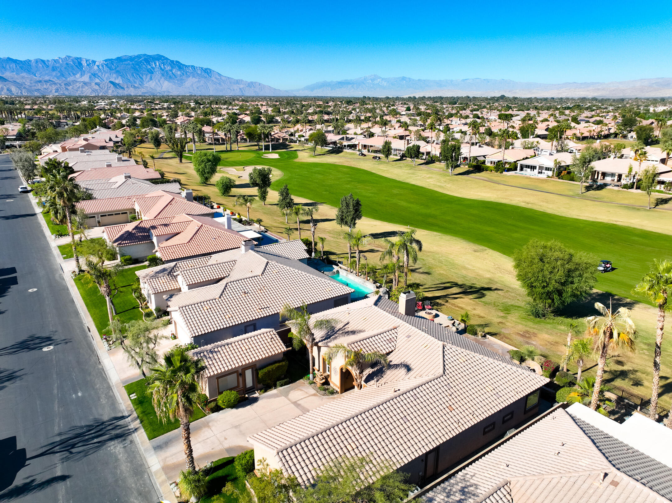 an aerial view of a house with outdoor space