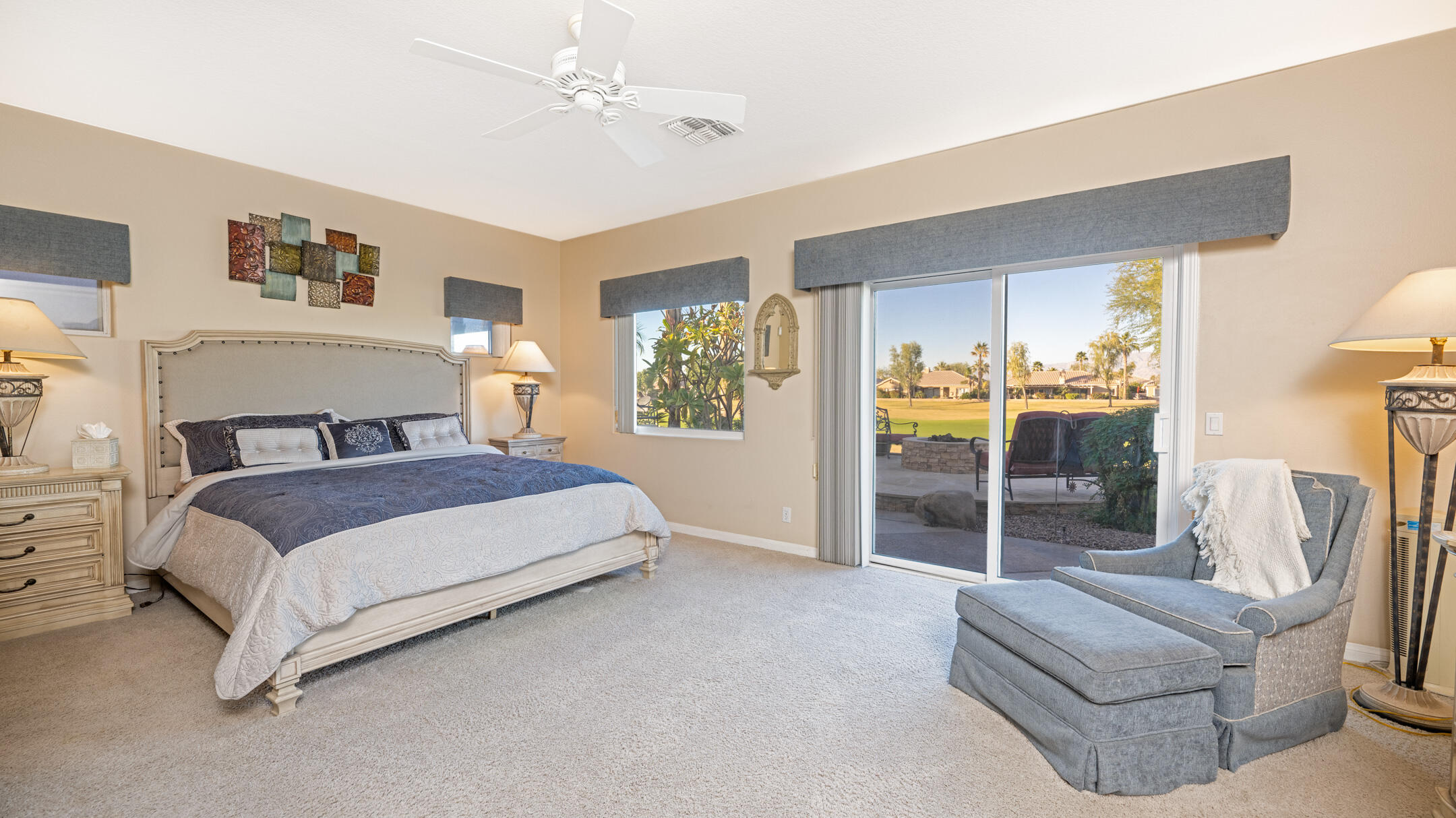 80290 Pebble Beach Drive Indio, CA 92201 - Photo 14 of 44 a bedroom with a bed couch and window
