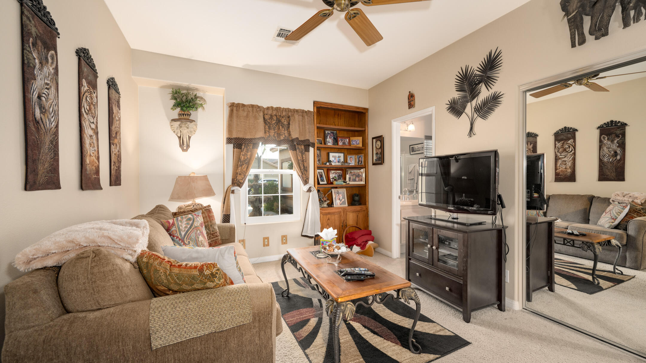 80290 Pebble Beach Drive Indio, CA 92201 - Photo 20 of 44 a living room with furniture and a flat screen tv