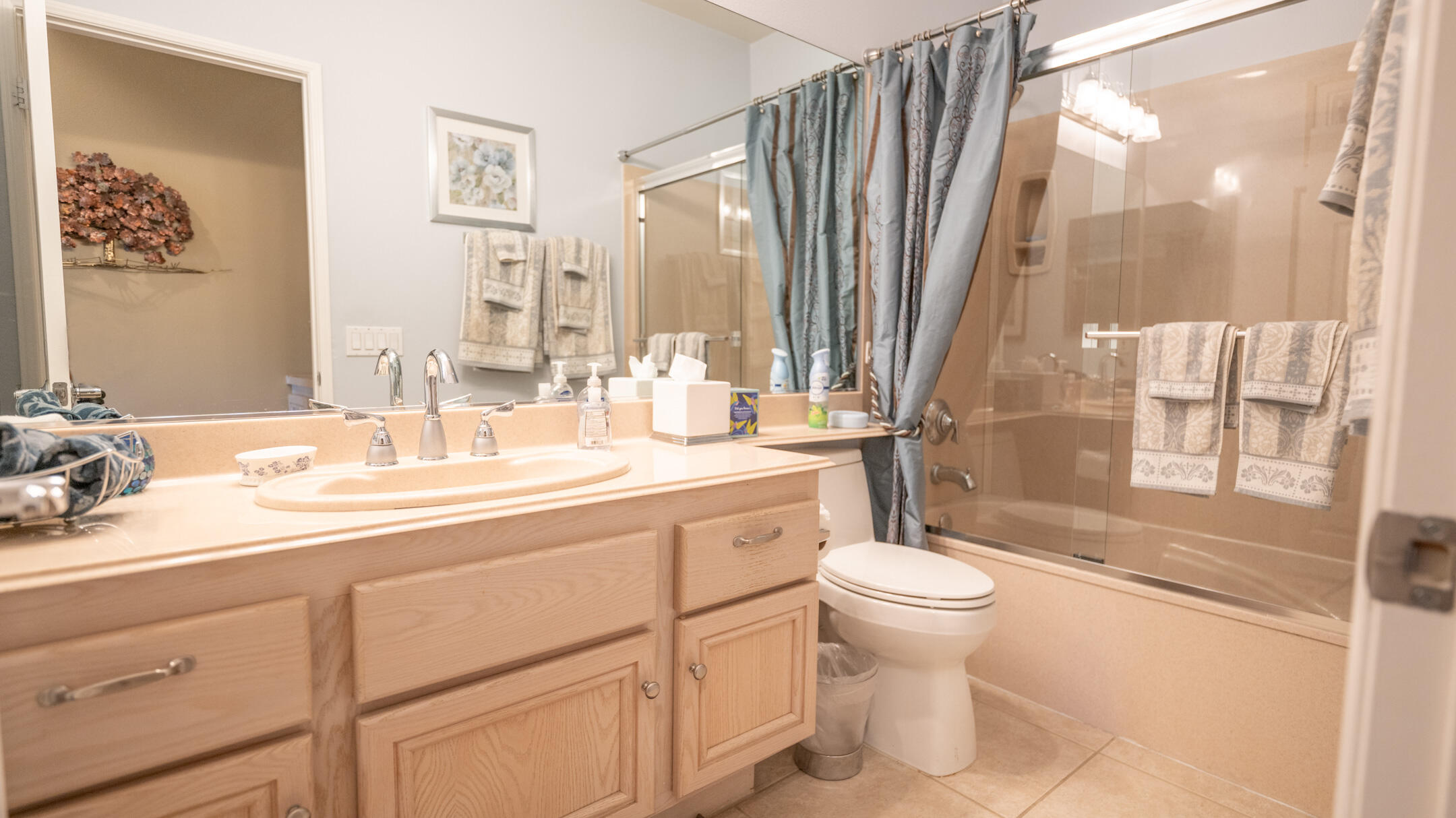 80290 Pebble Beach Drive Indio, CA 92201 - Photo 22 of 44 a bathroom with a double vanity sink toilet and a mirror