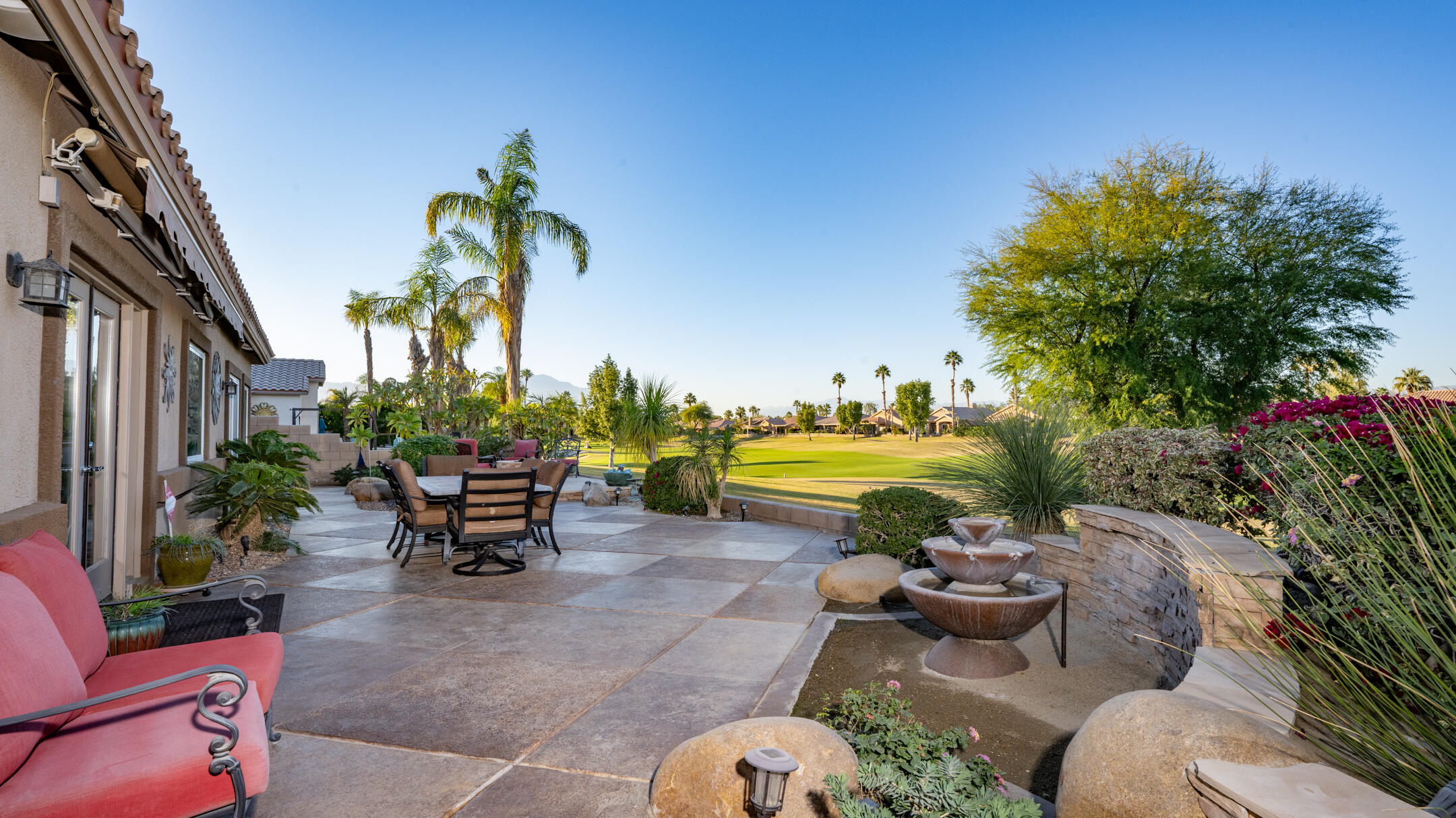 80290 Pebble Beach Drive Indio, CA 92201 - Photo 28 of 44 a view of a swimming pool and lounge chair