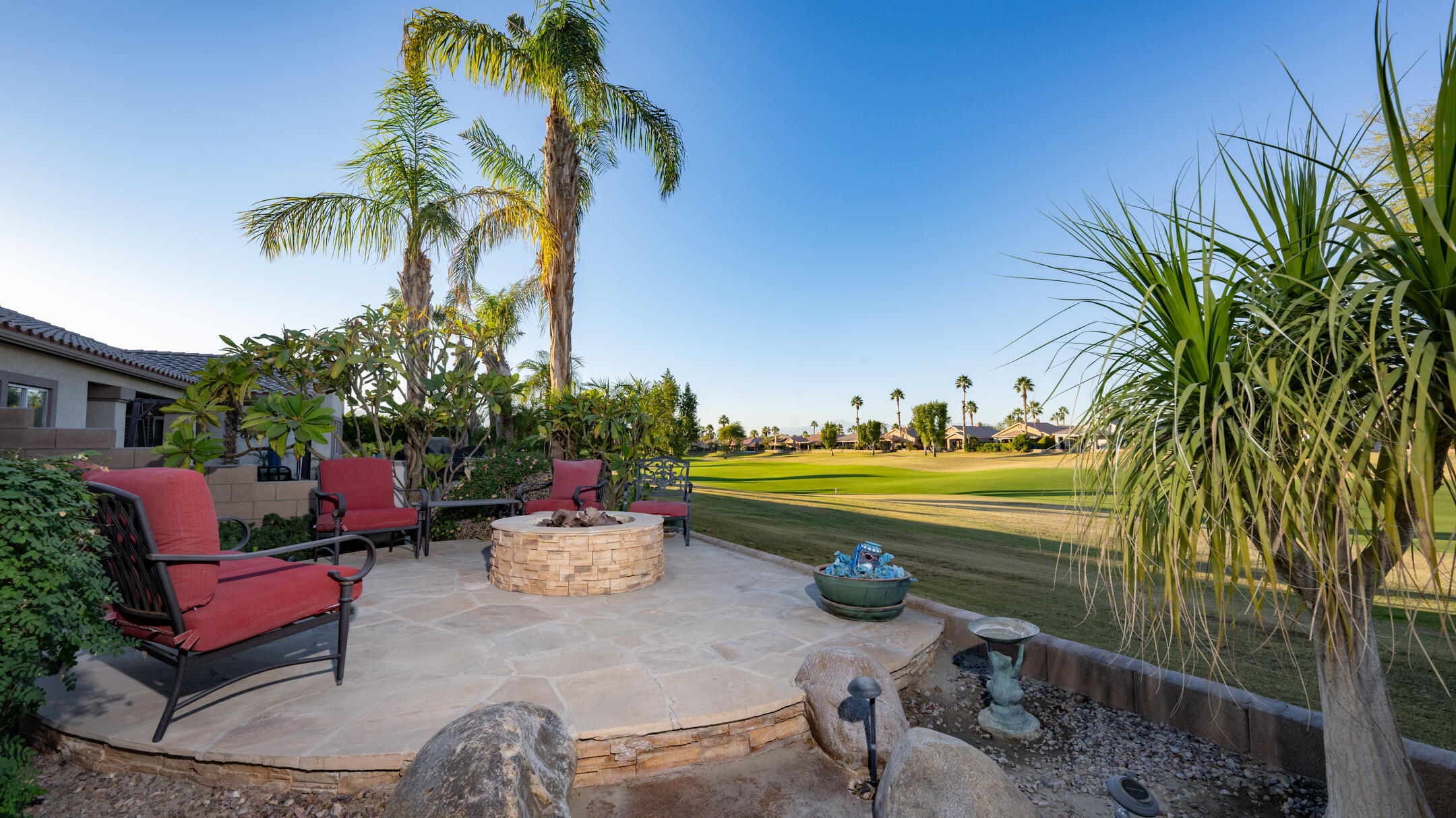80290 Pebble Beach Drive Indio, CA 92201 - Photo 30 of 44 a view of a swimming pool and lounge chairs