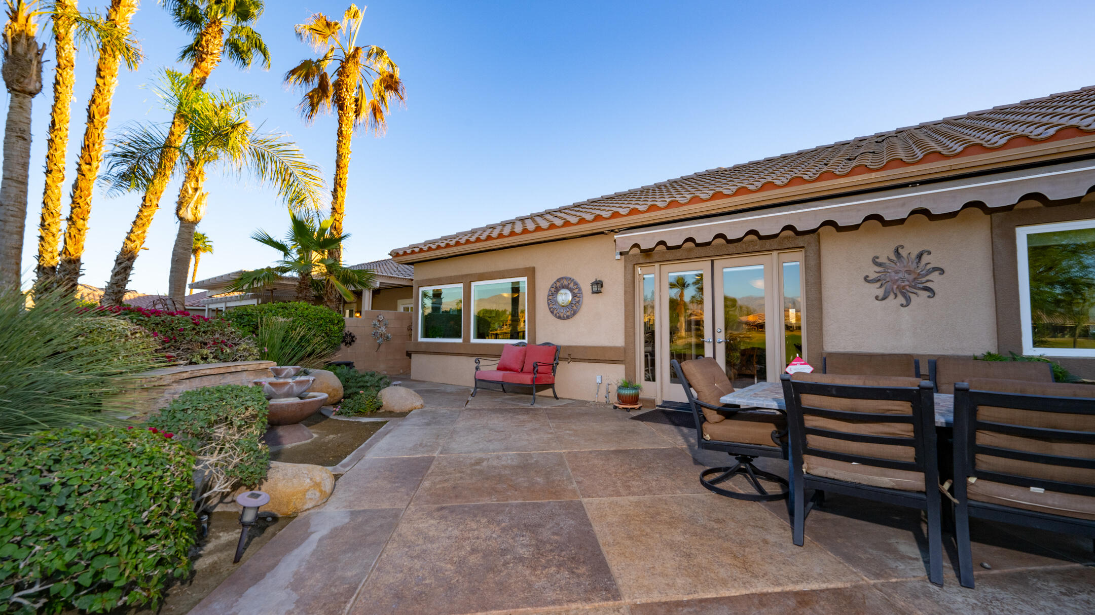 80290 Pebble Beach Drive Indio, CA 92201 - Photo 32 of 44 a view of a lounge chairs in patio of a house