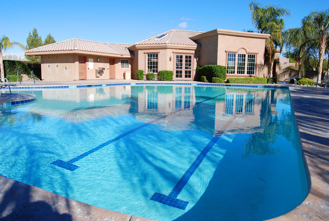 80290 Pebble Beach Drive Indio, CA 92201 - Photo 38 of 44 a front view of a house with a yard