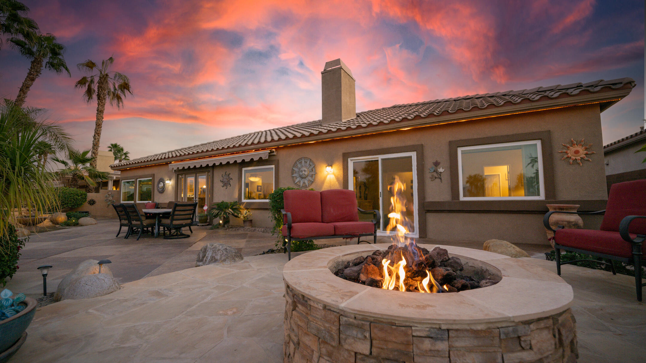 80290 Pebble Beach Drive Indio, CA 92201 - Photo 4 of 44 a front view of house with outdoor seating