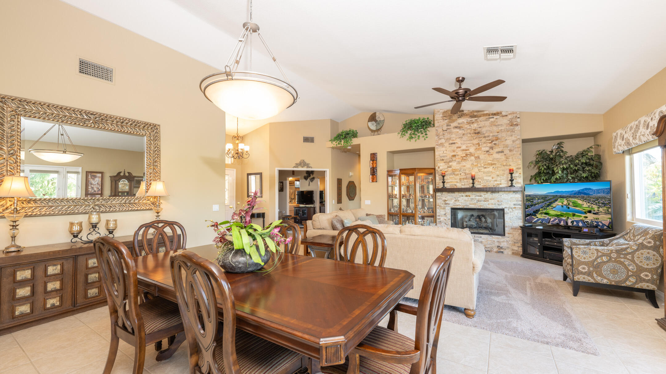 80290 Pebble Beach Drive Indio, CA 92201 - Photo 9 of 44 a view of a dining room with furniture