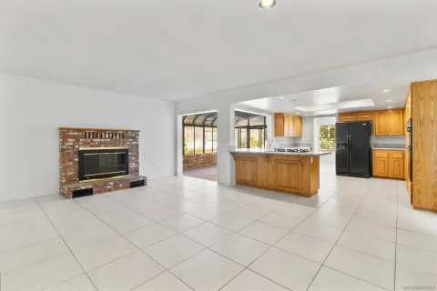 a view of an empty room and window