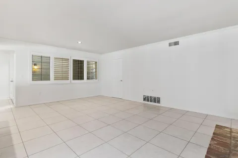 a view of a room with windows