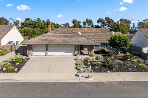 a aerial view of a house with sitting area