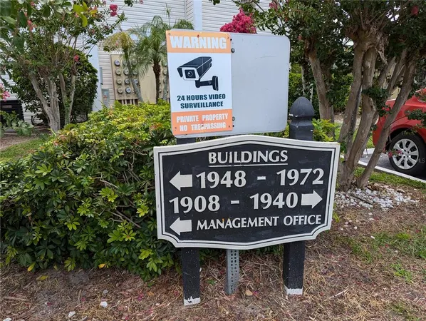 a view of outdoor space with palm trees