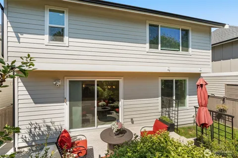 a backyard of a house with seating space