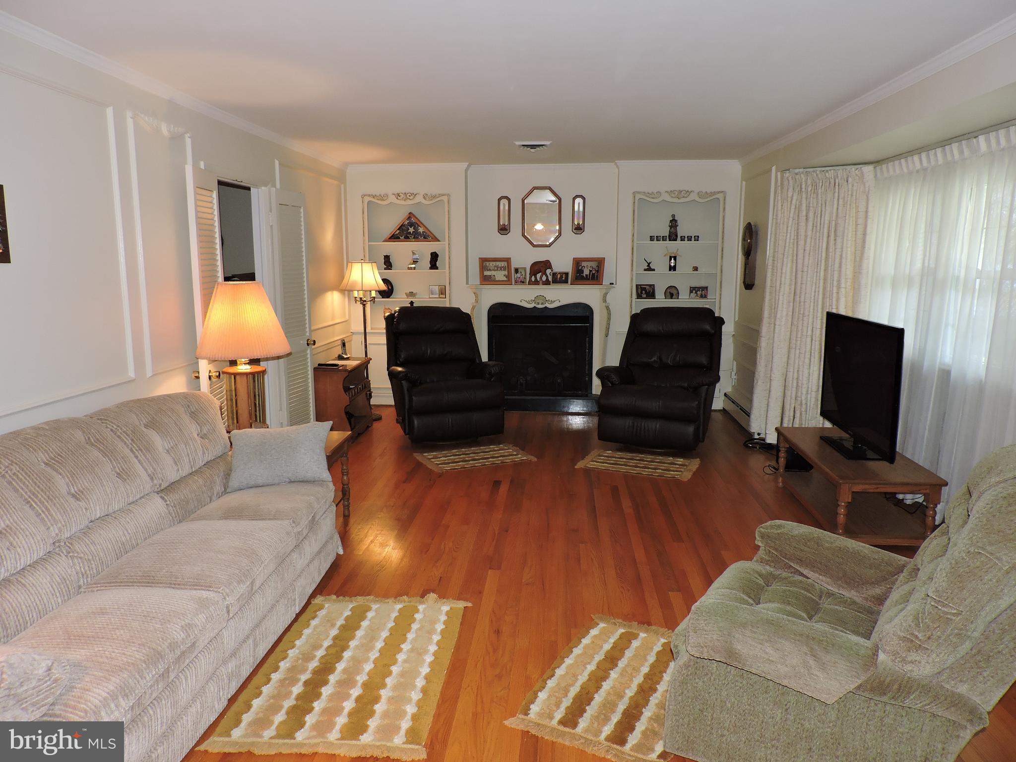 7209 Kempton Road Lanham, MD 20706 - Photo 12 of 35 living room with fireplace