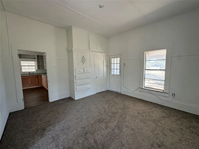 an empty room with windows